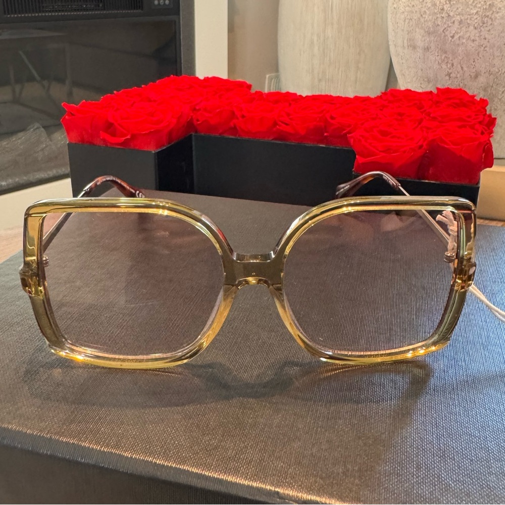 Cos & Linda Farrow sunglasses